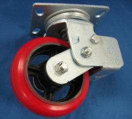 Caster; Swivel; 6" x 2"; PolyU on PolyO; Plate (4"x4-1/2"; holes: 2-5/8"x3-5/8" slots to 3"x3"; 3/8" bolt); Roller Brng; 700#; Spring Loaded (300#/ 400#) (Item #64243)