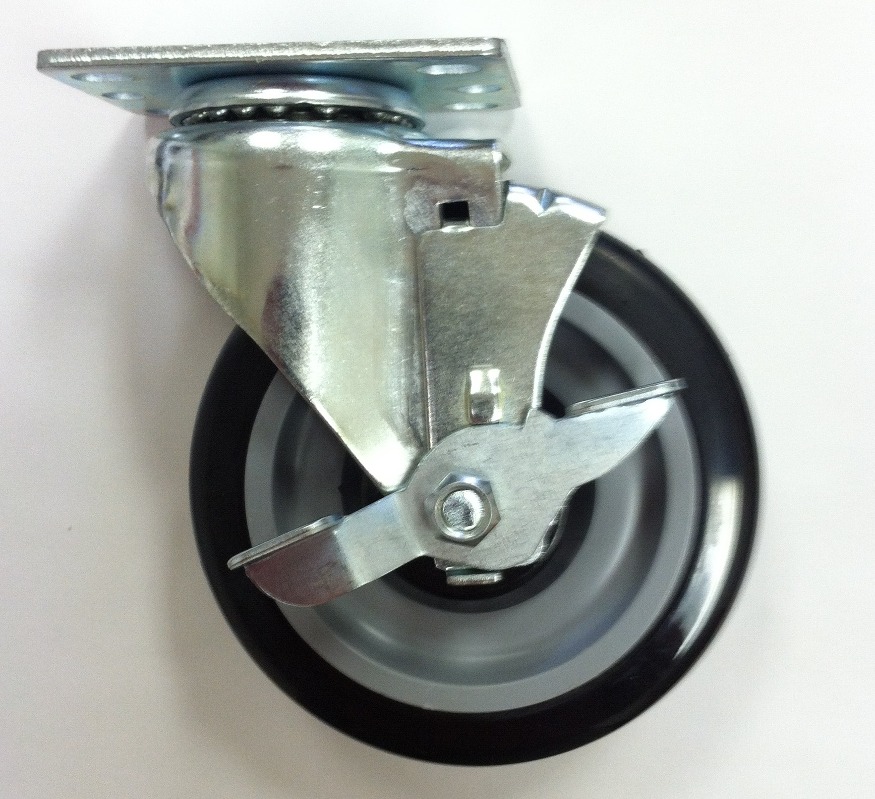 Caster; Swiv; 3 x 1-1/4; Rubber; Hard; Top Plate; 2-1/2x3-5/8; holes: 1-3/4x2-7/8 (slotted to 3); 5/16 bolt; Zinc; Ball Brng; Wgt Cap: 250; Top Lock; TG (Item #69954) Caster; Swiv; 3 x 1-1/4; Rubber; Hard; Top Plate; 2-1/2x3-5/8; holes: 1-3/4x2-7/8 (slotted to 3); 5/16 bolt; Zinc; Ball Brng; Wgt Cap: 250; Top Lock; TG (Item #69954)