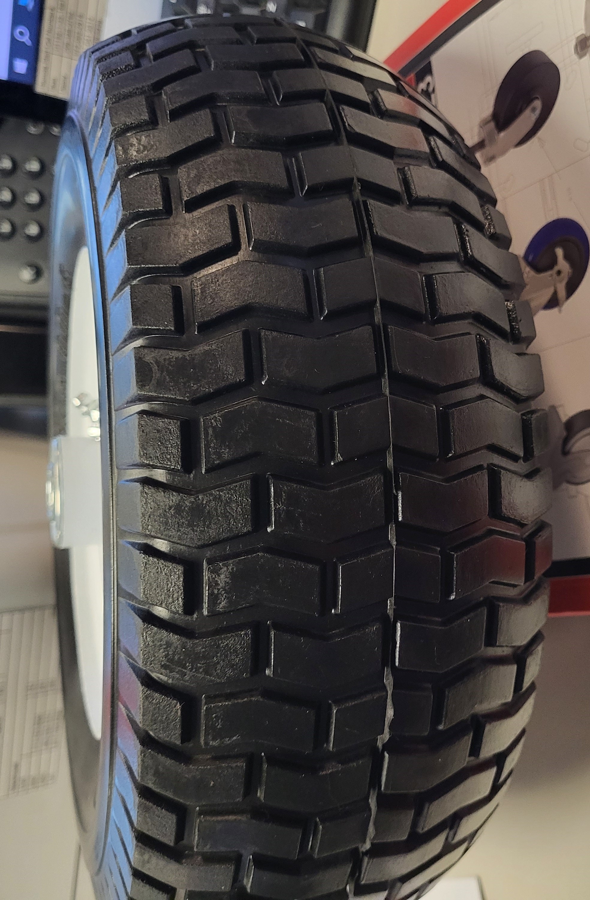 (image for) Wheel; 13" x 5"; Foam-Filled Flat Free Tire (Black); Ball Brng; 5/8" Bore; 5" Hub Length; 400#; White Centered Welded Hub; Turf Tread (Item #87471)